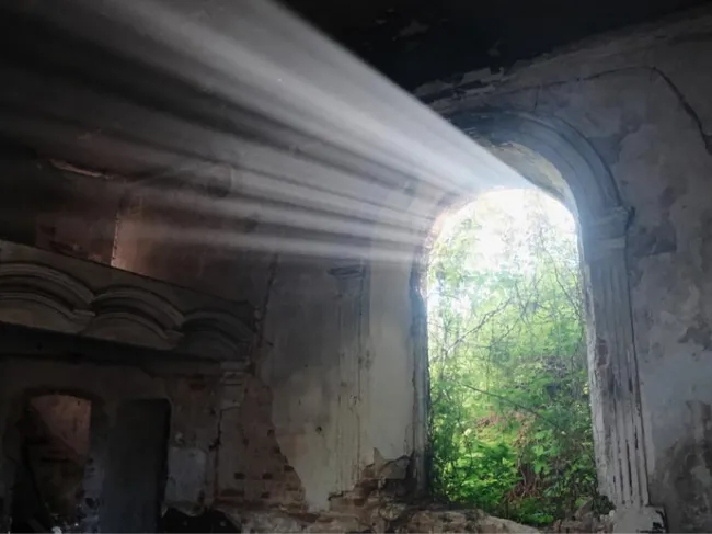 Sunlight shining into an old abandoned building